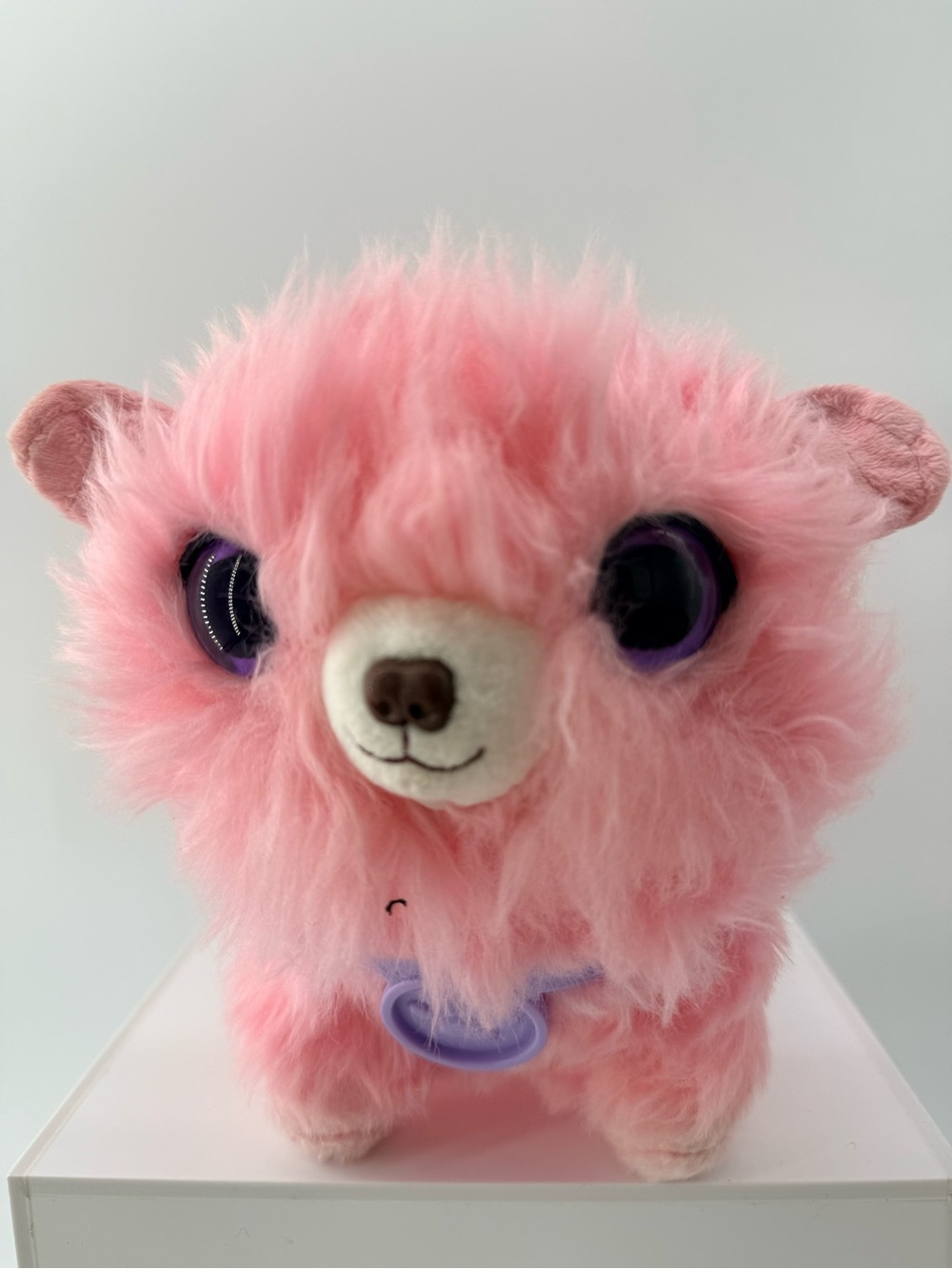 Cute Pink Fluffy Plush Pet with Purple Eyes